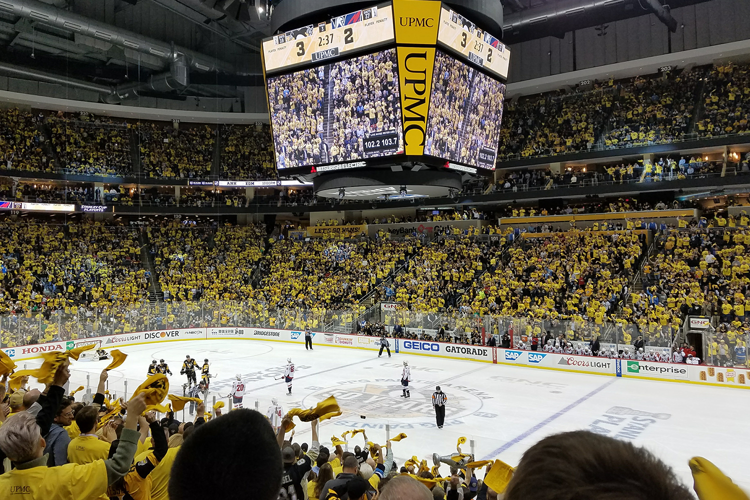 Pittsburgh Penguins - Members of the Pittsburgh Penguins watch as the 2016 Stanley  Cup Banner is raised prior to the game against the Washington Capitals at  PPG Paints Arena on October 13